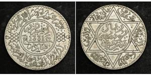  
 
    1912, Morocco, Sultan Yusef. Large Silver 10 Dirhams (1 Rial) Coin. AU-   Reference: KM-33.  Mint Place: Paris (France)  Mint Date: 1912 (AH 1331)   Condition: A small edge cut or hit at  ...