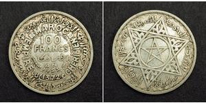  
  1953, Morocco, Mohammed V. Beautiful Silver 100 Francs Coin. XF!  Condition: XF! Reference: KM-52. Mint Place: Paris (France)  Mint Date: 1953 (AH 1372) Denomination: 100 Francs  Material: Si ...